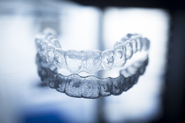 The Differences Between Invisalign and Invisible Braces - McCarthy